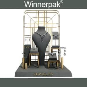 gray microfiber suede with brushed gold metal bases for an elegant retail presentation